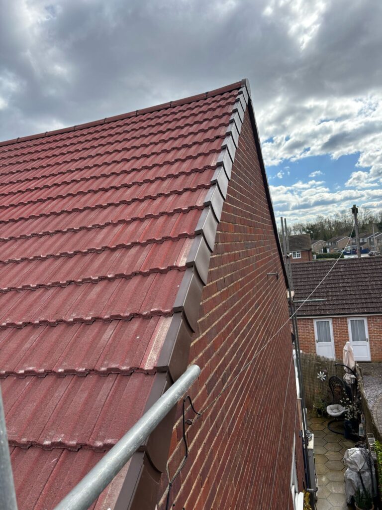 This photo shows a roof in Suffolk before spray foam removal started.