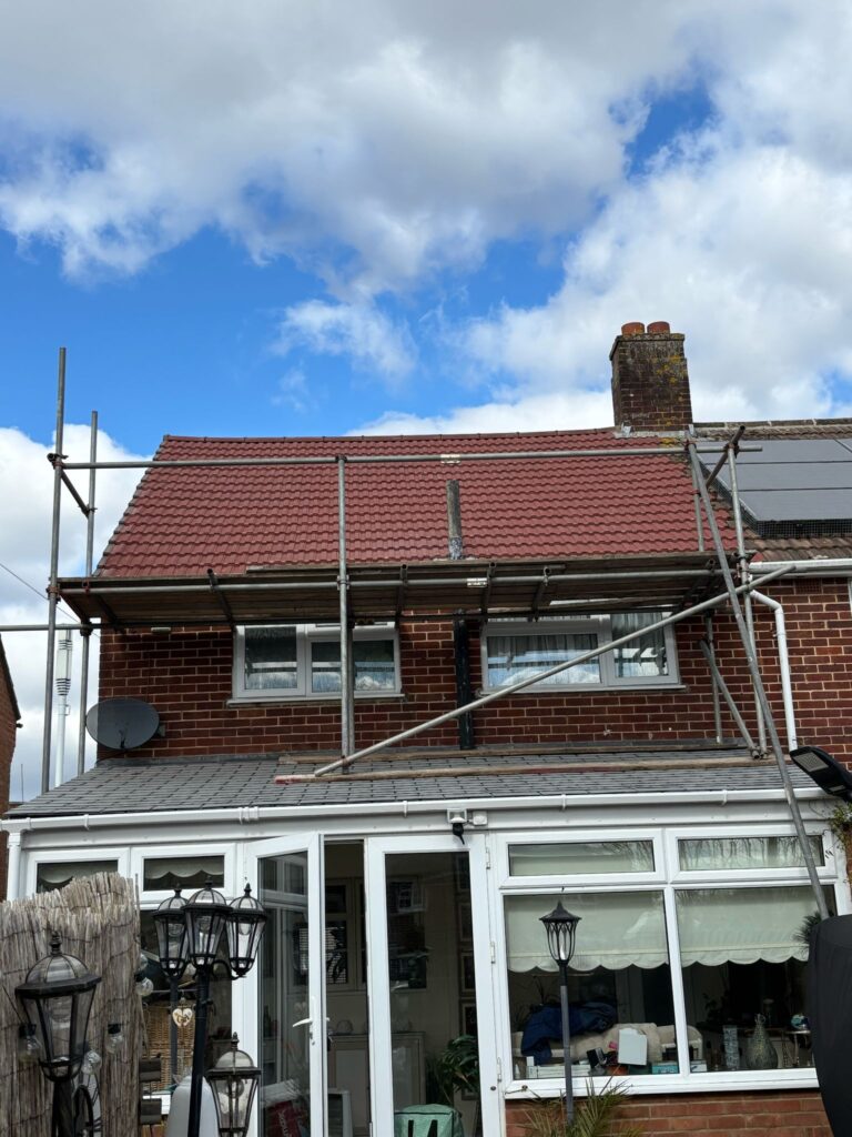 This photo shows a roof in Suffolk before spray foam removal started.